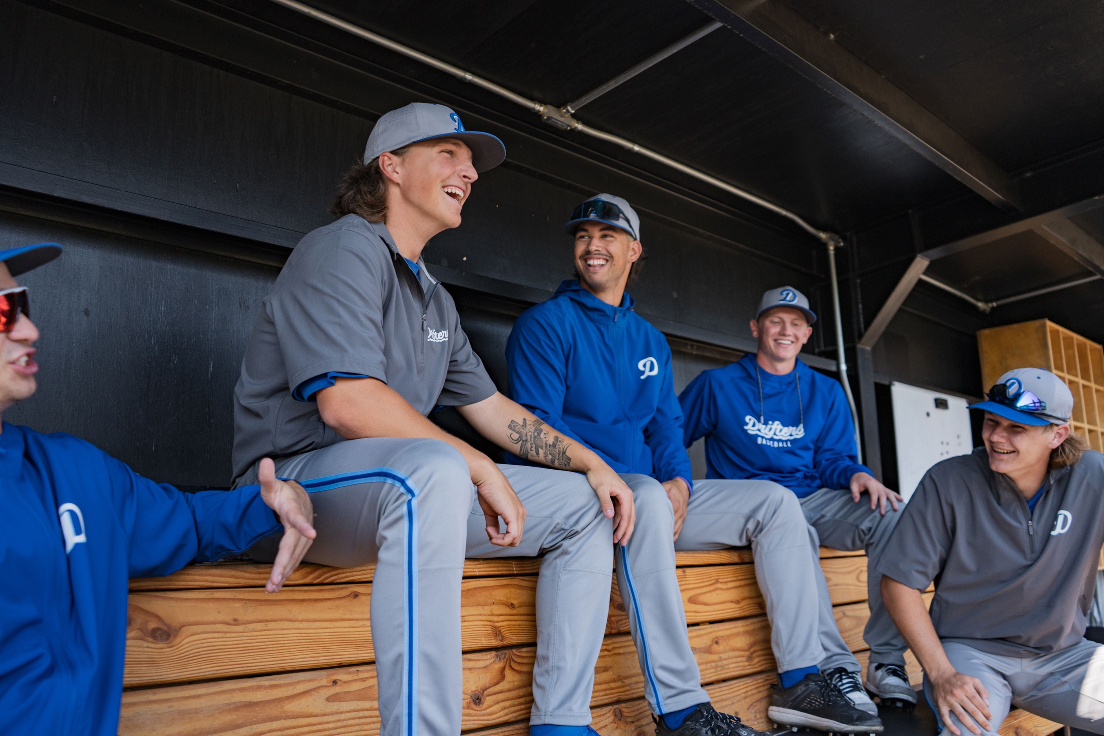A baseball team wearing blue uniforms